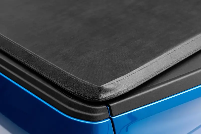 Lund Genesis Tri-Fold Tonneau Cover – Black Leather-Texture, No Cargo Channel 1